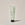 A tube of ACURE volumizing shampoo for fine hair, with a mint green label, against a neutral background.